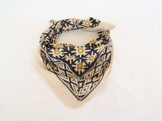 Patterned bandana with geometric design on a white background