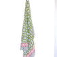 Long, patterned sarong with green base and red and white accents on a white background