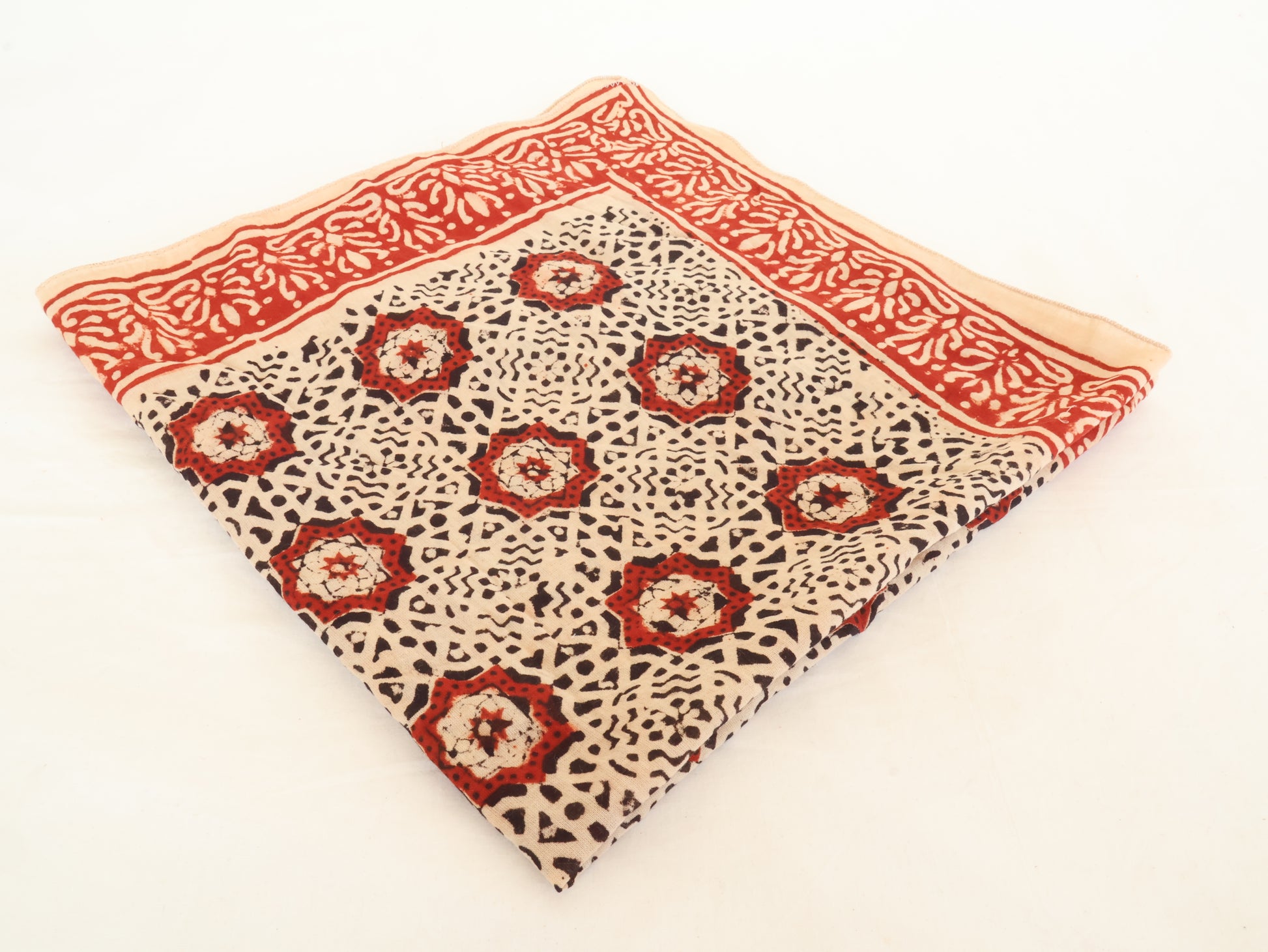 Artisan handmade cotton bandana with leafy border design