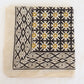 Hand block printed cotton bandana in black and mustard