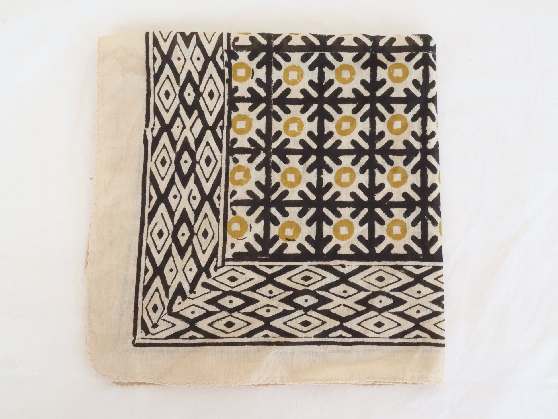 Hand block printed cotton bandana in black and mustard