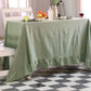 Green tablecloth on a dining table 