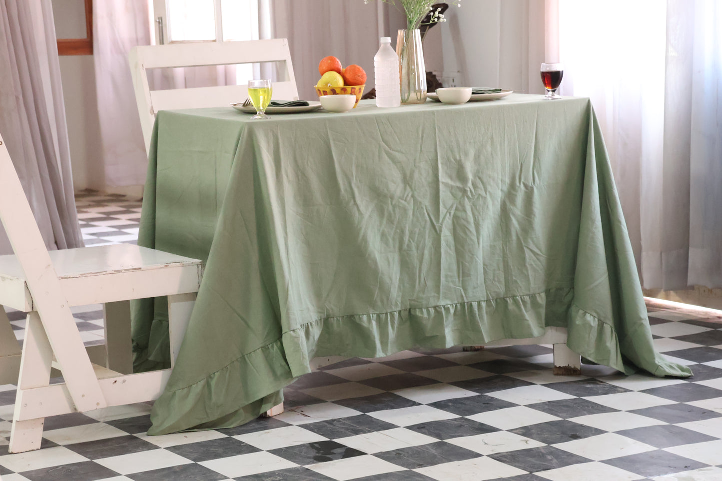 Green tablecloth on a dining table 