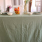 Dining table with a green tablecloth