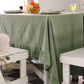 Green tablecloth on a white table