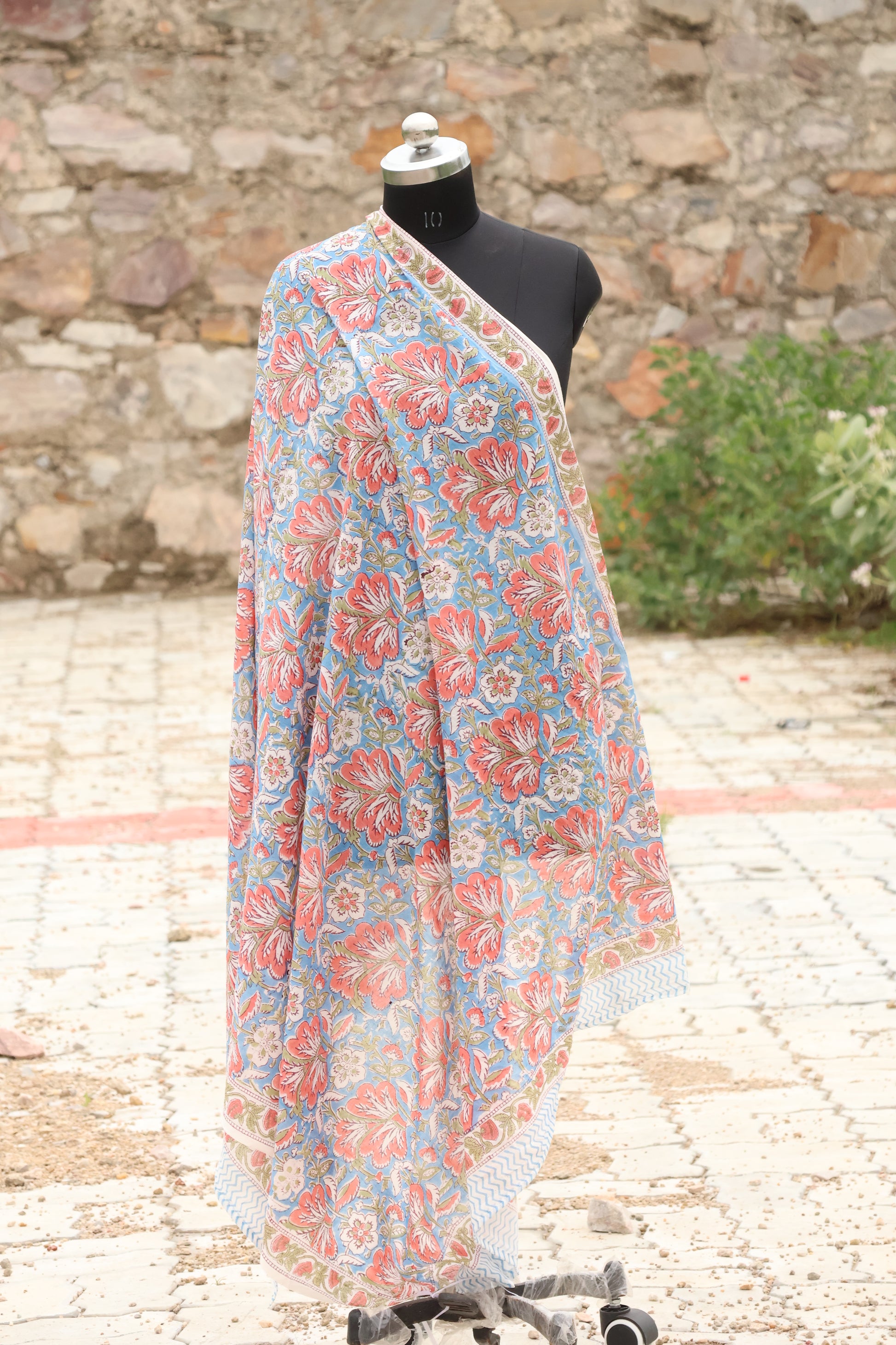 Handblock printed cotton sarong with coral floral design on blue 