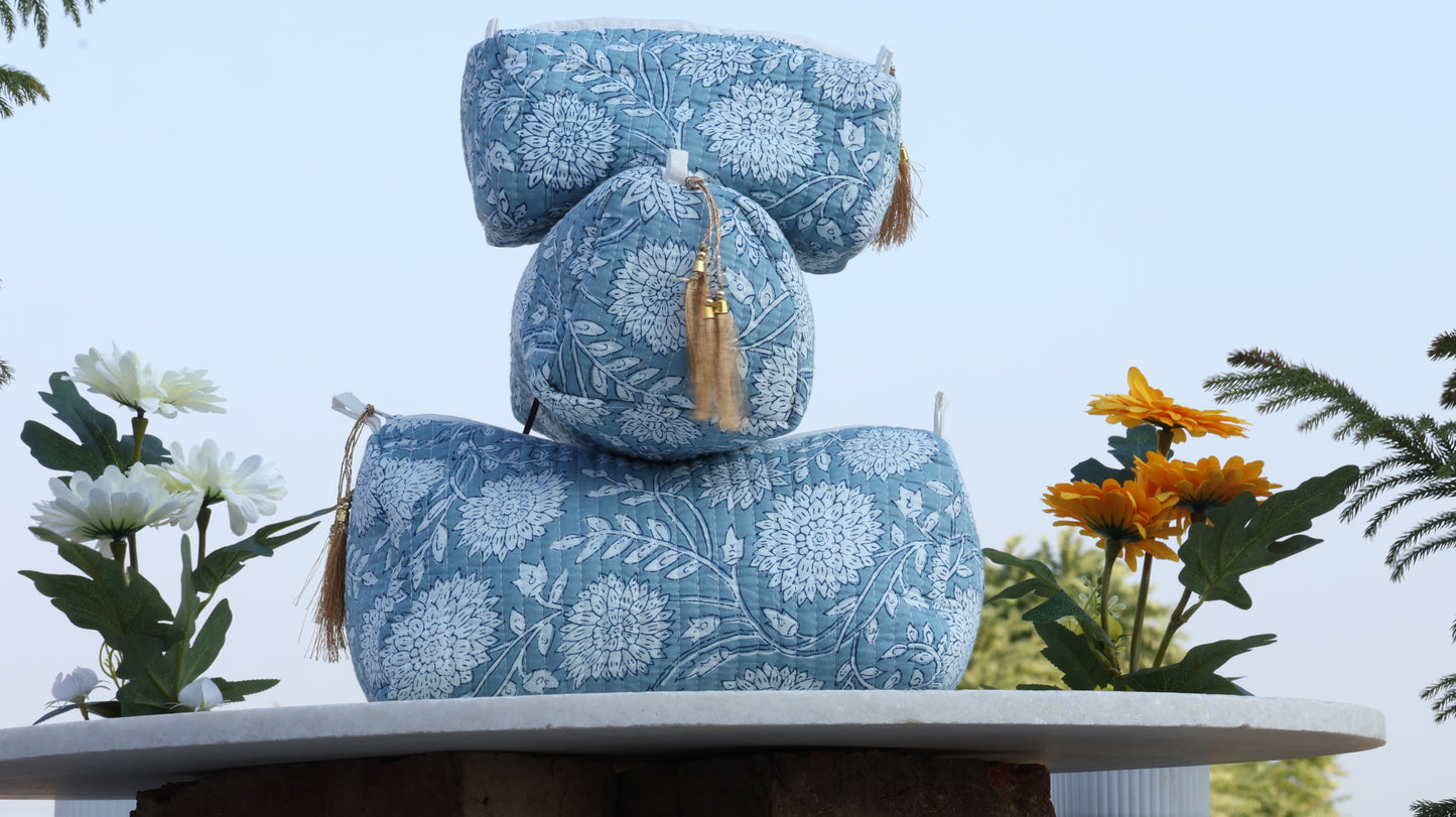 Artisan-made blue floral makeup organizer pouch with padded cotton design