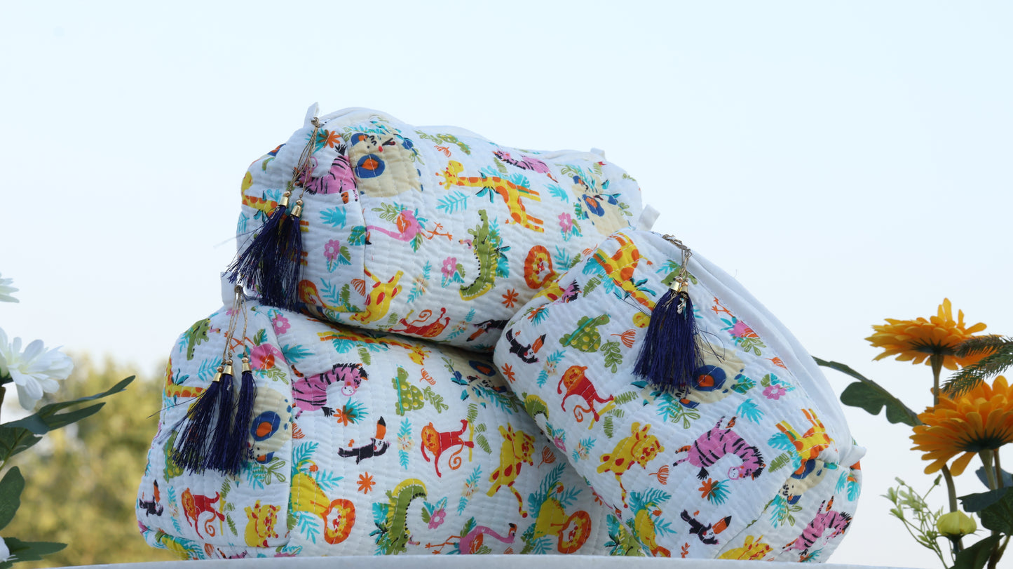 Colorful fabric bags with cartoon designs on a white background